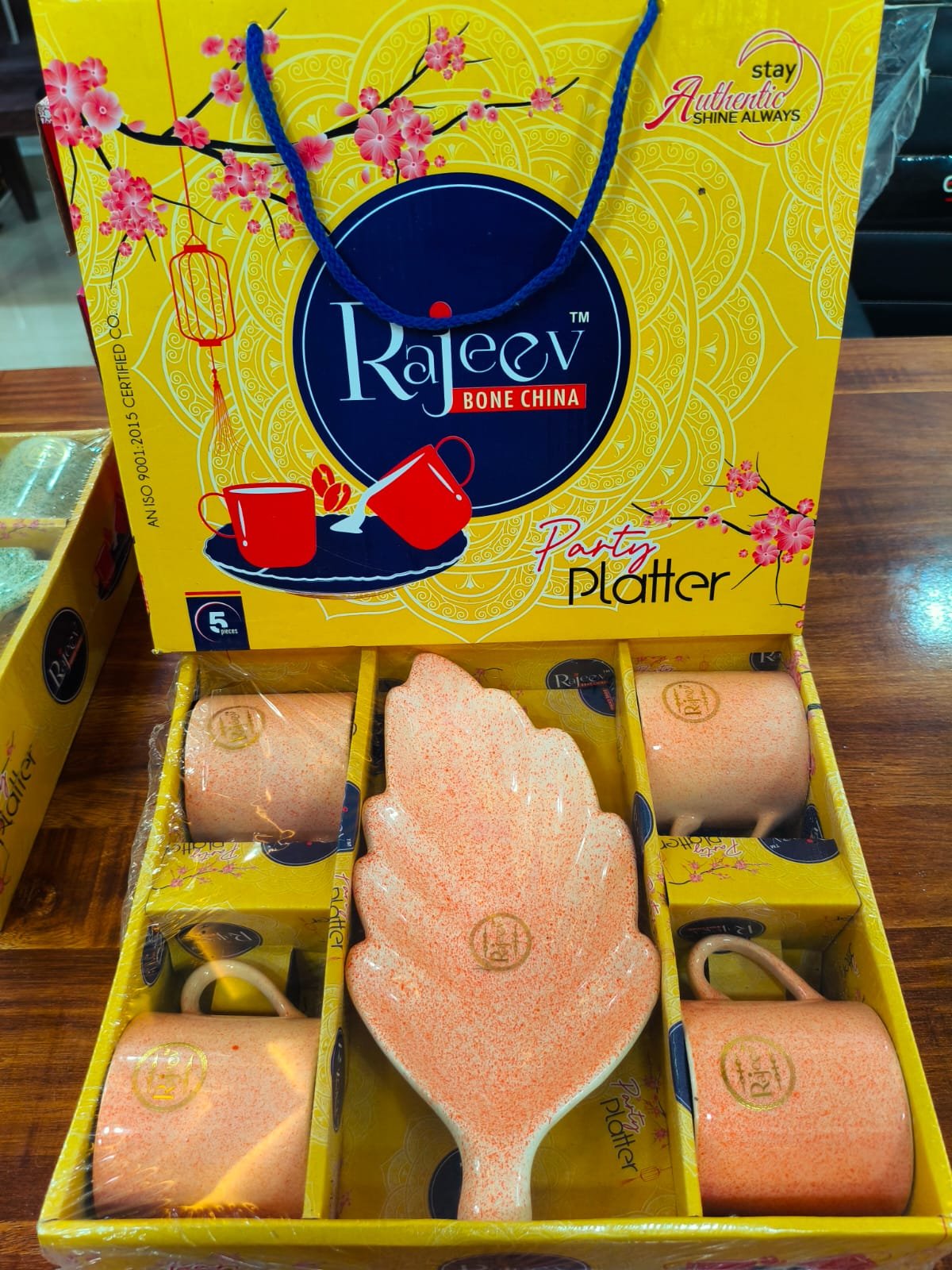 rajeev bone china party platter set (6 pcs – orange speckled with leaf platter)